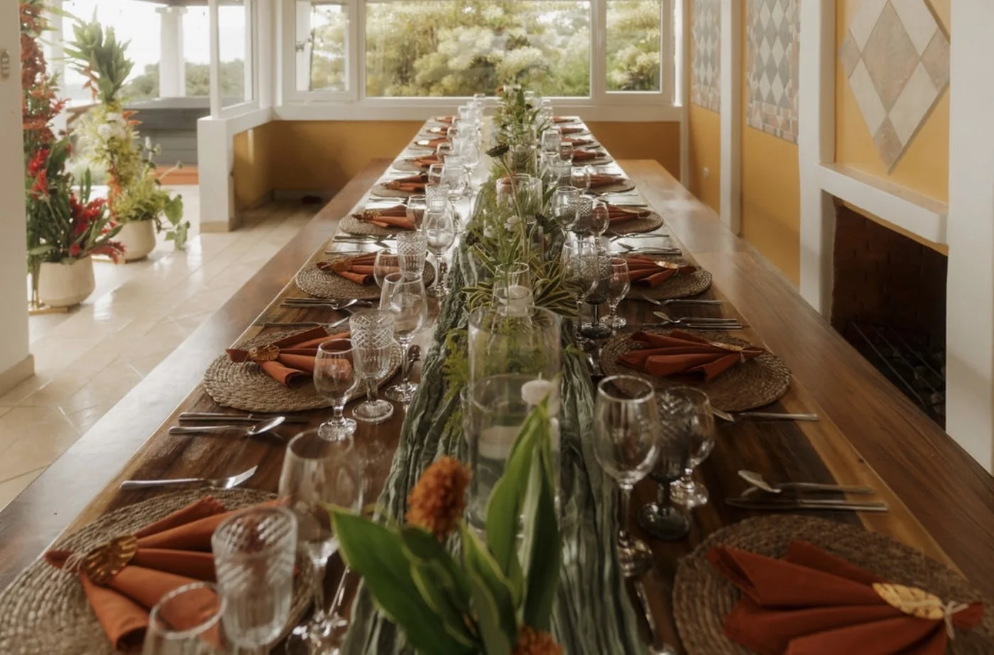 Long outdoor dining table set for a group at Elements