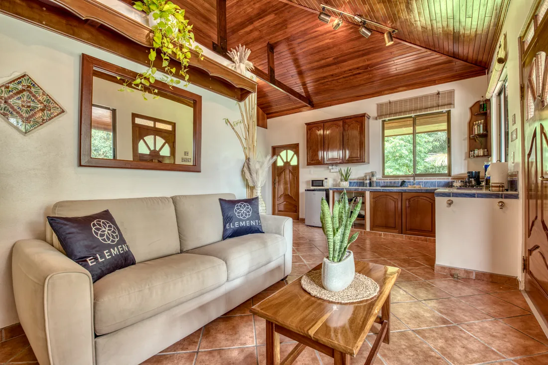 Living room and kitchenette at the Enchanted Cottage